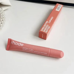Rhode moisturizing and nourishing gloss. Transparent finish with a hint of vanilla and watermelon